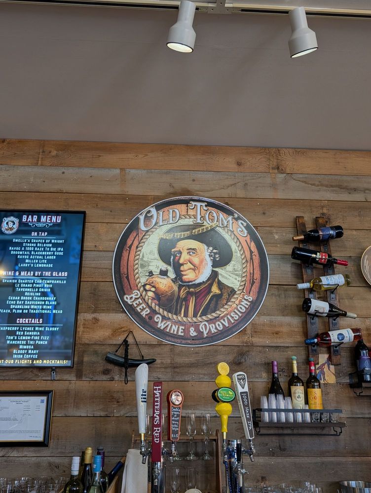 Old Toms Manteo Logo