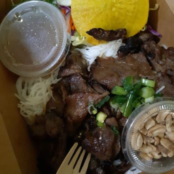 PHO 128 - Box of vermicelli with grilled pork and tons of vegetables. The nūoc cham dressing was 100% authentic too. 10/10. - Vietnamese Near Me - Concord, Ontario
