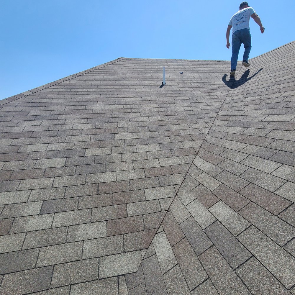Slide of Quantum Roofing and Construction
