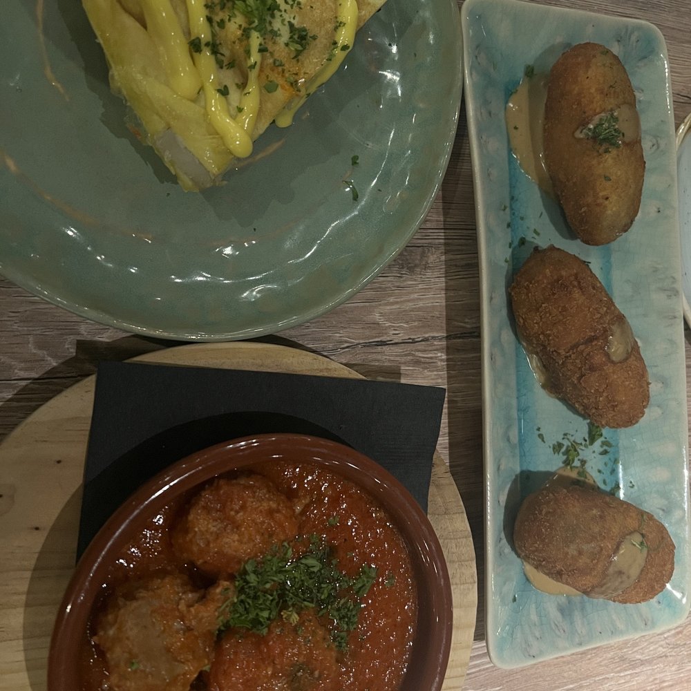 Barrio Social - Lamb meatballs, mushroom and ham croquettes, and Spanish tortilla with truffle and mushroom - Spanish Near Me - Vail, Colorado Barrio Social - Lamb meatballs, mushroom and ham croquettes, and Spanish tortilla with truffle and mushroom - Spanish Near Me - Vail, Colorado