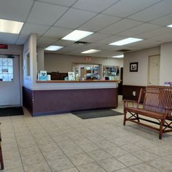 Lakewood Veterinary Service - Reception area, with children's bench and books off-camera.