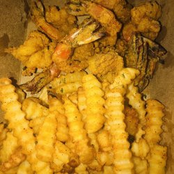 Large fried shrimp with choice of sides fries and red beans