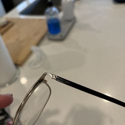 Frame Fixer - Temple of glasses, popped back into place.