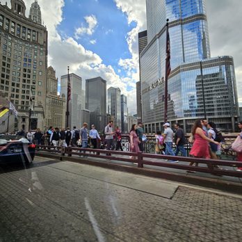 Chicago Riverwalk - Tourists enjoying the walk - Landmarks & Historical Buildings Near Me - Chicago, Illinois Chicago Riverwalk - Tourists enjoying the walk - Landmarks & Historical Buildings Near Me - Chicago, Illinois