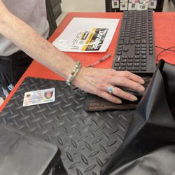 AutoZone Auto Parts - Debbie removing all the stickers off my new battery instead of giving me my 3 year warranty