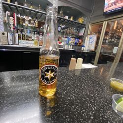 M & G Burger - View from the bar. Bottled beers and a few on tap.
