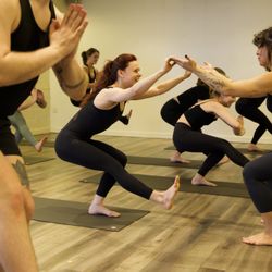 Tangerine Yoga - Playful. Empowered. Holding each other up (literally).