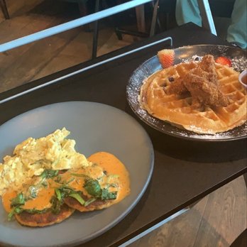 Fellaship - Salmon croquettes and eggs on the left and fried chicken and blueberry lemon waffle on the right - Cigar Bars Near Me - Atlanta, Georgia Fellaship - Salmon croquettes and eggs on the left and fried chicken and blueberry lemon waffle on the right - Cigar Bars Near Me - Atlanta, Georgia