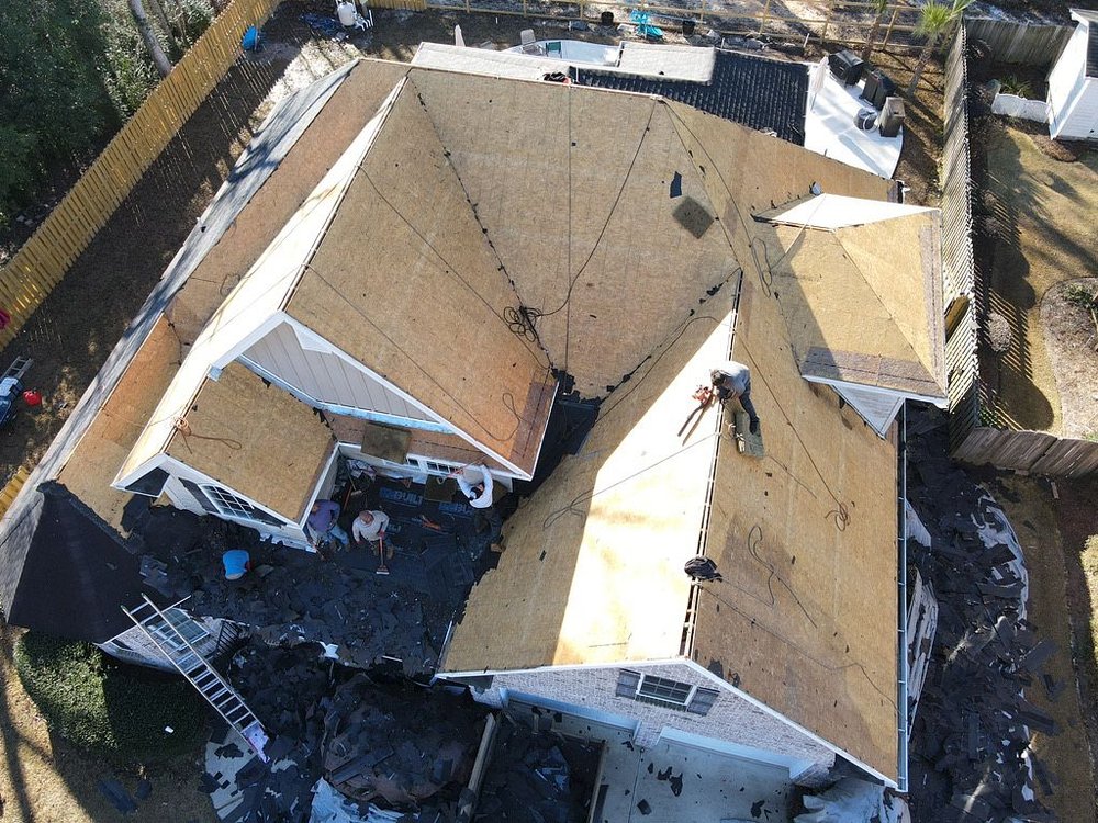 Slide of Roof and Restoration Experts