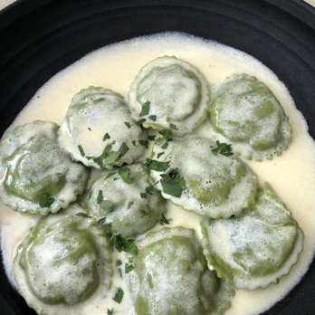 Doppio Zero Concord Veranda - Ravioli $18 Homemade spinach ravioli, filled with wild mushrooms and ricotta, fondue truffle sauce - Italian Near Me - Concord, California