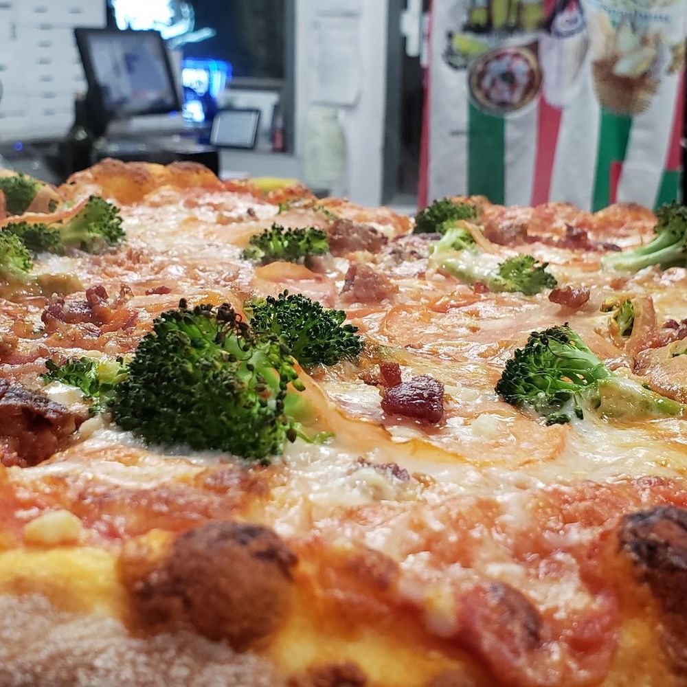 Scuotto's Pizza Cafe - Pizza - Pizza Near Me - Sunrise, Florida Scuotto's Pizza Cafe - Pizza - Pizza Near Me - Sunrise, Florida