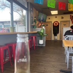 Camacho's Tacos - Corona in bottle.lounge area