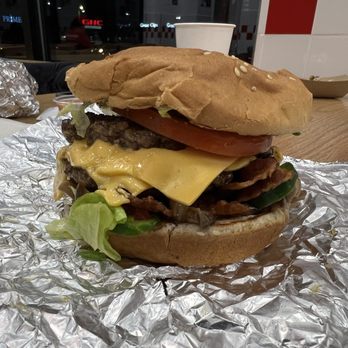 Five Guys - a hamburger with cheese and lettuce - Burgers Near Me - West Jordan, Utah Five Guys - a hamburger with cheese and lettuce - Burgers Near Me - West Jordan, Utah