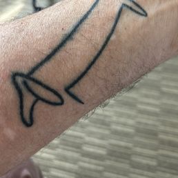 Tattoo I had done at Nokomis Tattoo. Credit to Pablo Picasso's dachshund, Lump, for inspiration.