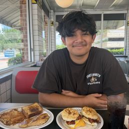 Two biscuits and a chicken dinner plate Two biscuits and a chicken dinner plate