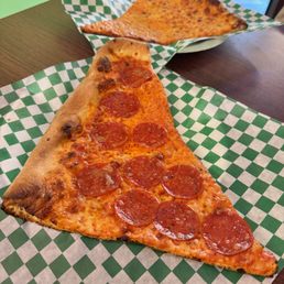 Burnt pepperoni and cheese pizza