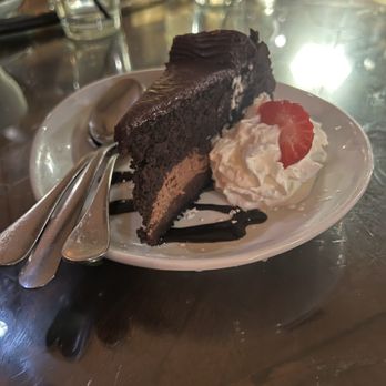 The Badger's Den - Chocolate cake with chocolate icing, chocolate moose, with gold, fluffy, whipped cream. - Barbeque Near Me - Prescott, Arizona