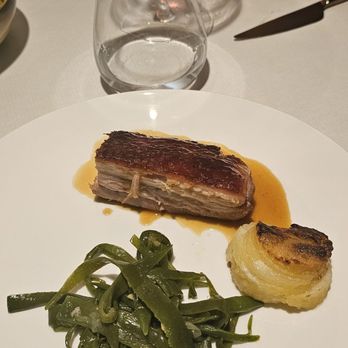 Parizzi - Crispy spiced suckling pig with potato cake and green beans.  The BEST of an amazing meal. - Italian Near Me - Parma, Puerto Rico