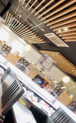 Kura Revolving Sushi Bar by null