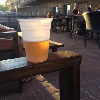 Button Brew House - A beer on their patio - Breweries Near Me - Tucson, Arizona