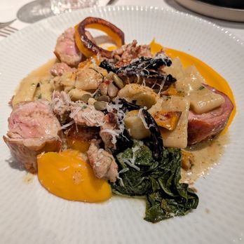 THE CHASTAIN - Rabbit & Italian Sausage Roulade. Entree $50. Paccheri, sage brown butter, butternut squash, pumpkin seed, braised mustard greens. - Diners Near Me - Atlanta, Georgia THE CHASTAIN - Rabbit & Italian Sausage Roulade. Entree $50. Paccheri, sage brown butter, butternut squash, pumpkin seed, braised mustard greens. - Diners Near Me - Atlanta, Georgia
