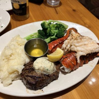 Black Angus Steakhouse - Filet Mignon with Mashed potatoes, broccoli and two lobster tails - Steakhouses Near Me - San Jose, California Black Angus Steakhouse - Filet Mignon with Mashed potatoes, broccoli and two lobster tails - Steakhouses Near Me - San Jose, California