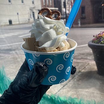 Sweet Swirls Rolled Ice Cream - a hand holding a cup of ice cream - Ice Cream & Frozen Yogurt Near Me - Corinth, Mississippi Sweet Swirls Rolled Ice Cream - a hand holding a cup of ice cream - Ice Cream & Frozen Yogurt Near Me - Corinth, Mississippi
