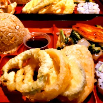 Tako Yaki - Bento box. Each come with rice, dumpling, California roll and vegtiable tempura. Your protein of choice is served on a bed of vegetables. - Japanese Near Me - Cleveland, Tennessee Tako Yaki - Bento box. Each come with rice, dumpling, California roll and vegtiable tempura. Your protein of choice is served on a bed of vegetables. - Japanese Near Me - Cleveland, Tennessee