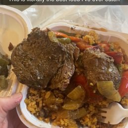 a person holding a tray of food a person holding a tray of food