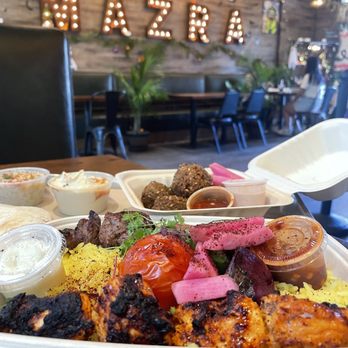 Mazra - Our order of Double Kebab Plate, and Half-dozen Falafels. Industrial chic decor. - Middle Eastern Near Me - San Bruno, California