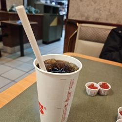 Arby's - Medium Coke Zero Sugar with a Califoria-required Paper Straw