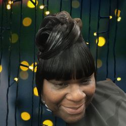 Pincurl updo with twist and bangs
