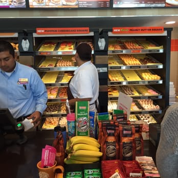Dunkin' - Counter with doughnuts behind - Donuts Near Me - Laguna Hills, California
