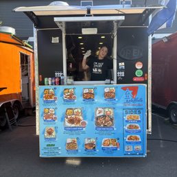 The owner Isla Bella , waiting to serve you good delicious authentic Cuban food. Always with a smile. The owner Isla Bella , waiting to serve you good delicious authentic Cuban food. Always with a smile.