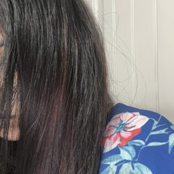 Ethos Aveda - One strand of burgendy.