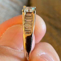 Express Watch Repair - You can see how on the left side something was done to my ring while it was in their shop.