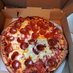 Don Brand's Pizza - Small extra sauce and well done, pepperoni.  The cheese shifted because of the xtra sauce.