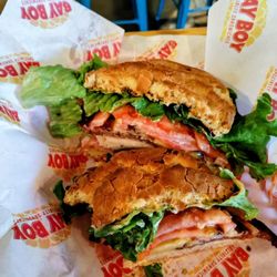 Bay Boy - Club sandwich with toasted gf bun and smoked Gouda