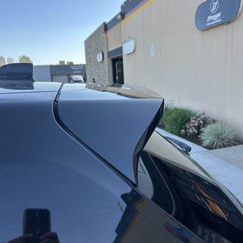 Dynamic Auto Custom - Side view of spoiler vinyl wrap - Car Window Tinting Near Me - Santa Ana, California