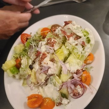 Mankas Grill - Wedge salad was just excellent. This picture is after we chopped it up. So crisp and delicious - American Near Me - Fairfield, California Mankas Grill - Wedge salad was just excellent. This picture is after we chopped it up. So crisp and delicious - American Near Me - Fairfield, California
