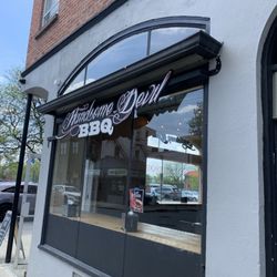Handsome Devil - Restaurant Sign in front.