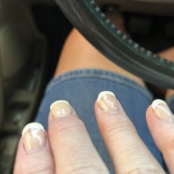 Austin Oasis Day Spa & Nails - Yellowed color, uneven application, lifting.