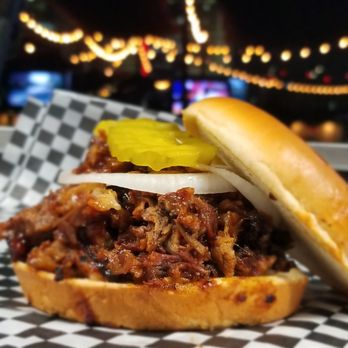 Coffee-Q - a pulled pork sandwich with pickles and pickles - Coffee & Tea Near Me
