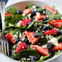 Corner House Deli - Spinach salad with strawberries, blueberries and feta cheese and your choice of nuts...