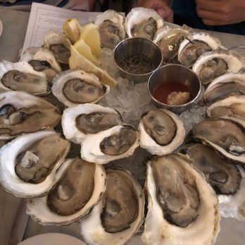 Neptune Oyster - Three kinds of oyster sharing. - Seafood Near Me - Boston, Massachusetts Neptune Oyster - Three kinds of oyster sharing. - Seafood Near Me - Boston, Massachusetts