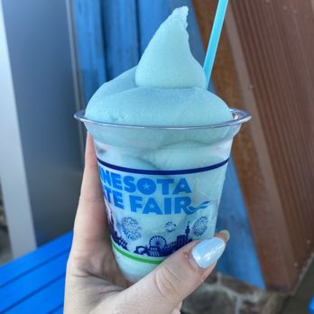 The Blue Barn - a person holding a cup of ice cream - Southern Near Me - Falcon Heights, Minnesota