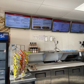 Tubby's - a restaurant counter with a variety of food items - Sandwiches Near Me - Waterford, Michigan Tubby's - a restaurant counter with a variety of food items - Sandwiches Near Me - Waterford, Michigan