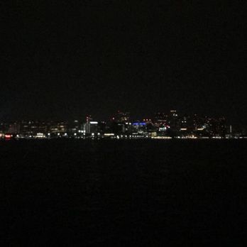 Boatonian - a view of a city at night - Bars Near Me - Boston, Massachusetts
