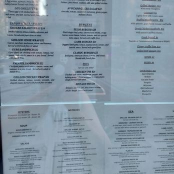Telio restaurant - Menu on window. - Greek Near Me - New York, New York Telio restaurant - Menu on window. - Greek Near Me - New York, New York