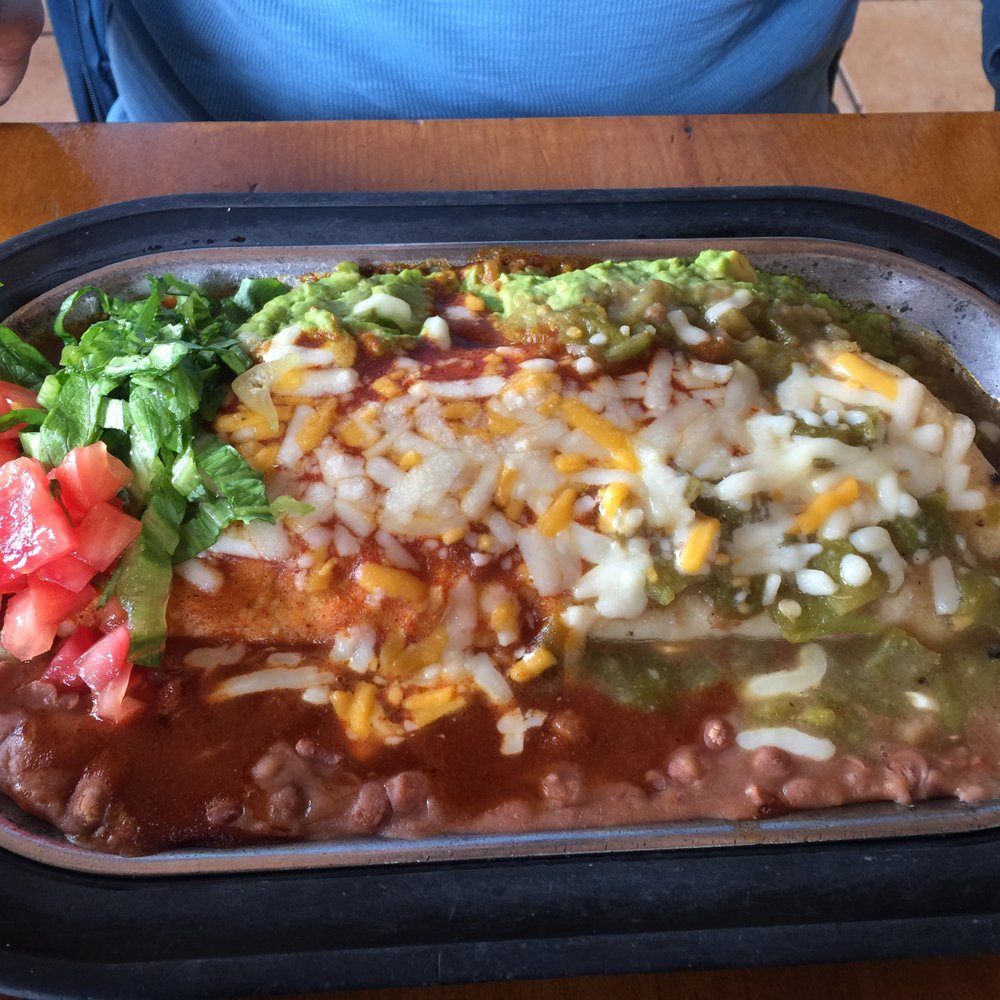 San Marcos Cafe - breakfast burrito with their homemade delicious sauce - Mexican Near Me - Santa Fe, New Mexico San Marcos Cafe - breakfast burrito with their homemade delicious sauce - Mexican Near Me - Santa Fe, New Mexico